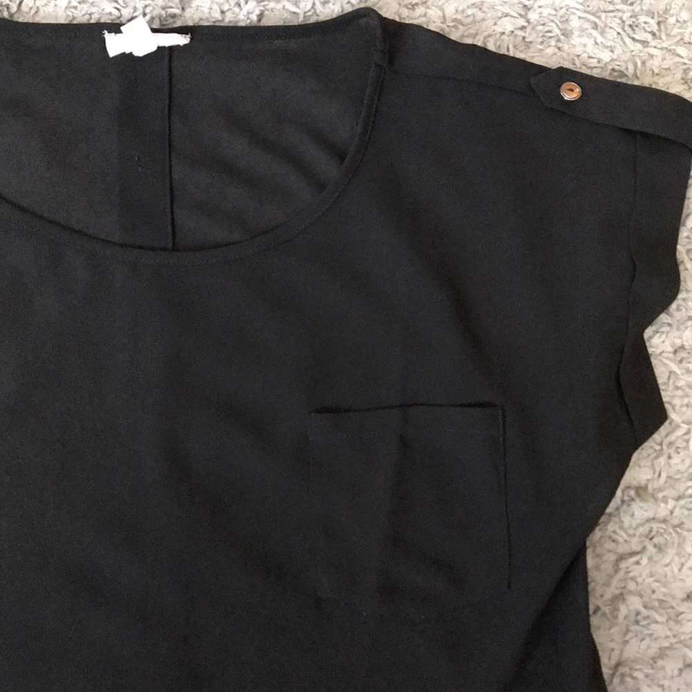 Sheer blouse with buttons down back
